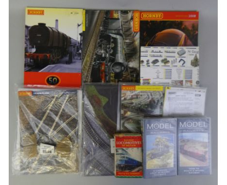 Hornby 'OO' gauge - Various railway related items comprising; Model Railways videos (x2), three Hornby Annuals; 2006 Edition 