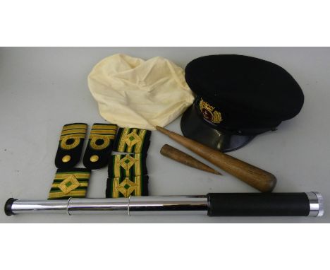 Various items of nautical related interest from the late 20th century, including a peaked Merchant Navy cap, another cap in d