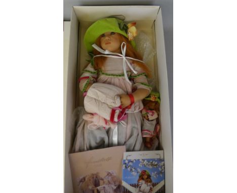 A boxed Annette Himstedt doll "Mirte", from the 1999 collection, 90cm tall, with light gray-green speckled eyes, copper-red g