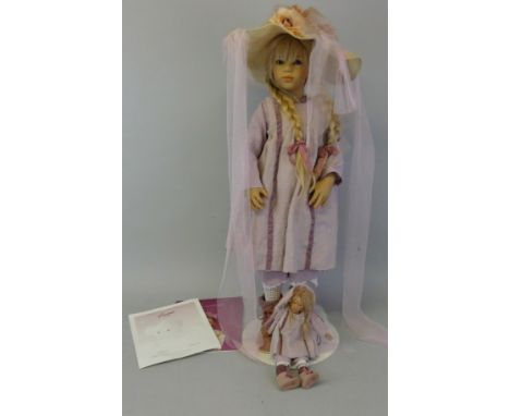 A boxed Annette Himstedt doll "Siri", from the 2002 collection, 83cm tall, light blue open glass eyes, blonde braided human h