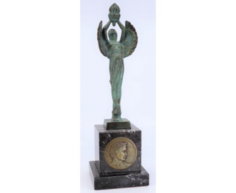 Georges Contaux (French, 1891-1984), an Art Deco bronze sculpture of an angel holding a flame, marked Montereau, raised on ma