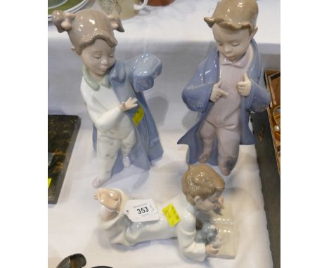 Three Nao figurines of children