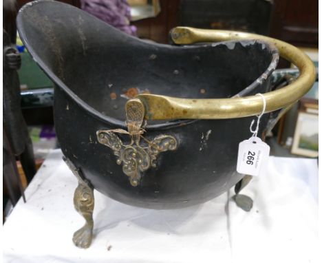 Black metal and brass coal helmet