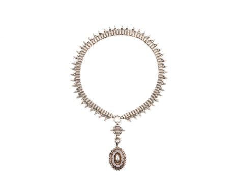 A VICTORIAN FRINGE LOCKET NECKLACEThe spiked necklace with two bolt rings, suspending a locket hallmarked Birmingham 1880, wi