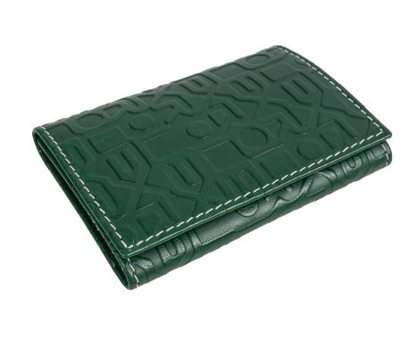 A ROLEX WALLETIn green embossed leather, with four card slots and a money clip, measuring 6.5cm x 9.5cm, with a box