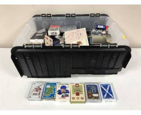 A box containing a large quantity of playing cards 