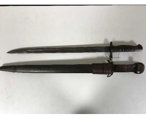 An American bayonet dated 1917, in scabbard
