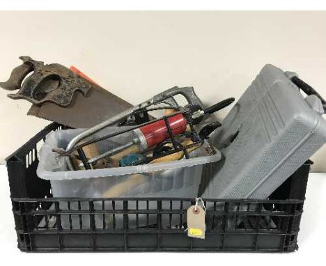 A basket of hand tools and a Performance electric sander 