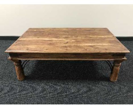 A pine rectangular coffee table with metal mounts and pair of matching lamp tables 