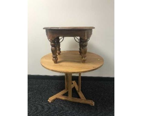 A circular pine pedestal coffee table and lamp table 