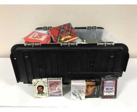 A box containing a large quantity of playing cards 