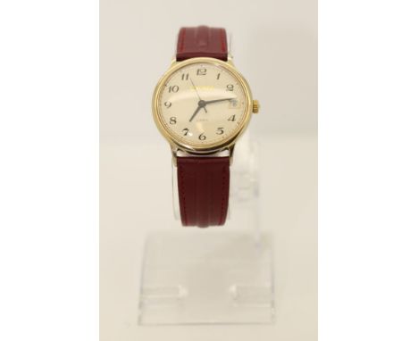 Sekonda Date. 17 Jewel Manual Wind Movement. Burgundy leather strap. Serial Number 900666. Original USSR Manufactured Sekonda