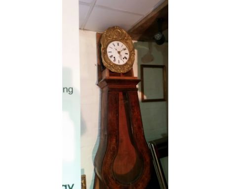 A 19th century comptoise clock in stained pine case. Whole case is present but sale room ceiling too low to fit and stand the