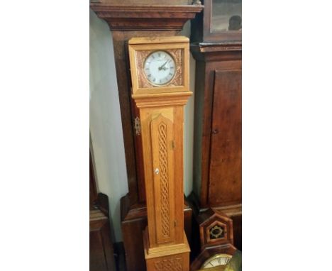 Modern quartz grandmother clock with copper decorative feature to face. All clocks &amp; barometers are offered for sale as s
