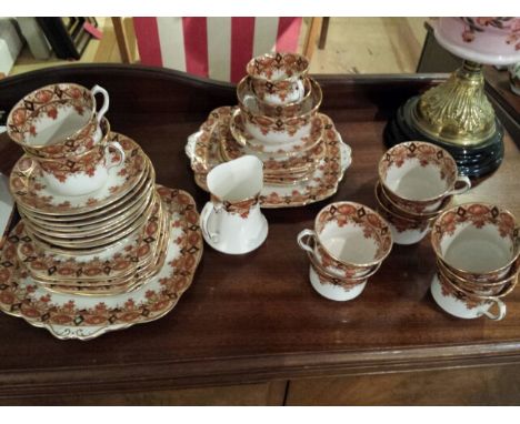 Extensive Roslyn vintage bone china tea service including 12 cups & saucers, sugar, creamer, various plates. All in very good