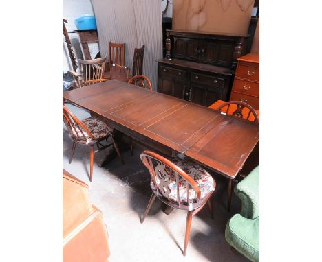 ERCOL DARK OAK DRAW LEAF TABLE AND FOUR CHAIRS AND COURT CUPBOARD 