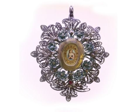 Devotional work in filigree composed of a phytomorphic floral decoration in silver threads starting from the cent where small
