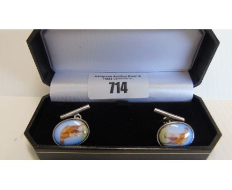 A Pair of Silver Enamel Cufflinks.
