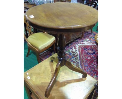 A Victorian Mahogany Circular Top Wine Table, standing on a turned pillar and inverted tripod base.