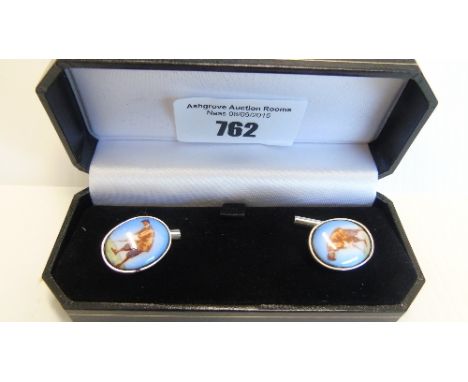 A Pair of Silver Enamel Golfing Cufflinks.