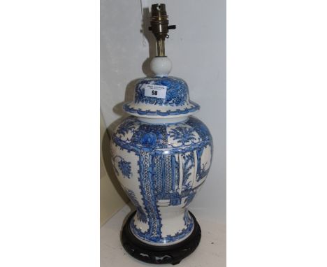 An Oriental Table Lamp Standing on a Turned and Pierced Base.