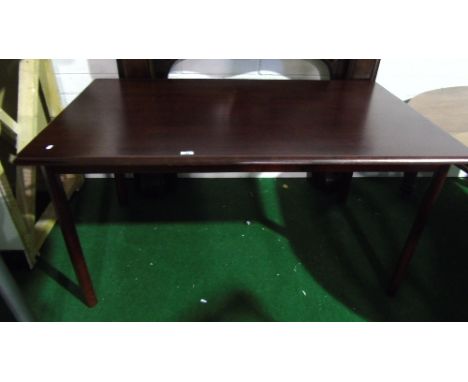 A Modern Mahogany Fire Surround along with a Kitchen Table.