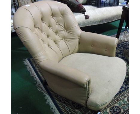 A 19th Century Armchair with Deep-Buttoned Back.