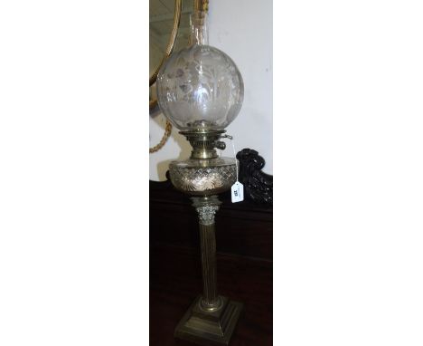 An Edwardian Brass and Glass Oil Lamp, with etched glass globular shade.