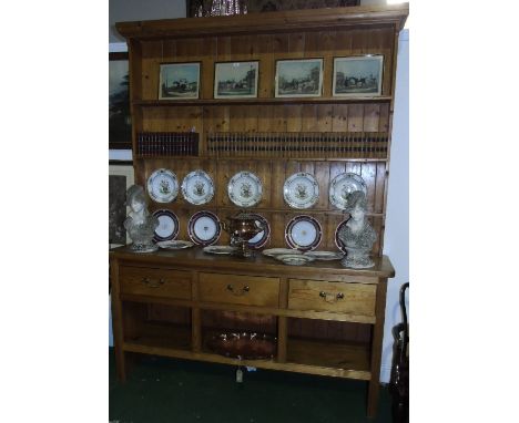 An Impressive Large Pine Kitchen Dresser, with plank back top above a base of three freize drawers and open platform shelf, 2