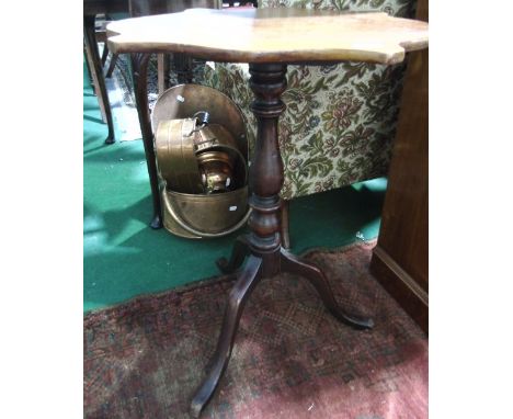 A Mahogany Tripod Table, with shaped top, 57 cm wide.