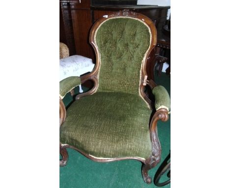 A Victorian Carved Walnut Open Armchair.