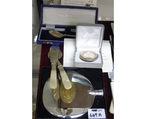 An Irish Silver Millennium Spoon (Limited Edition with Certificate from Weirs), along with a silver 'first lock of hair' fram