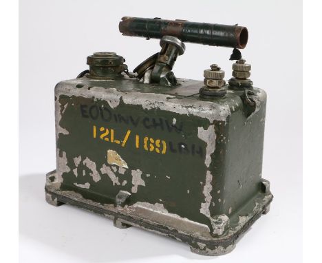 British military Dynamo Exploder Mk VII with plunger handle, on the top of the casing is a raised plunger receiver with a scr