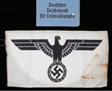 German Third Reich sports vest eagle ( Brustadler fur das Sporthemd) for the Heer (Army ), together with a Deutsche Reichsbun