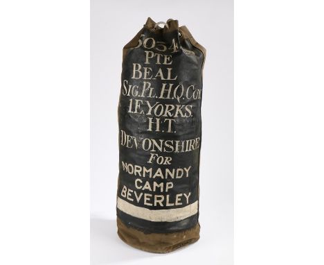 British army soldiers kit bag very neatly painted up to ' 23034519 PTE. BEAL, SIG PL, H.Q. COY, 1. E.YORKS, H.T. DEVONSHIRE, 