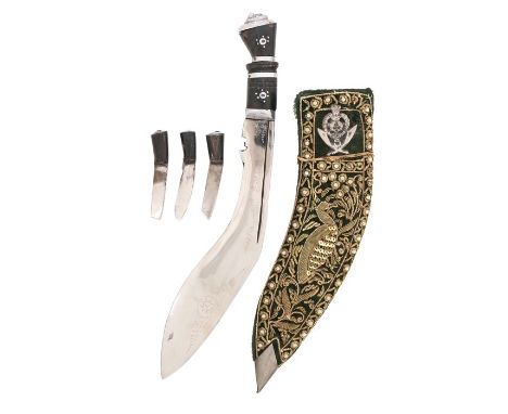 Ornamental Gurkha kukri made as a souvenir to the Indian army's 5th Gurkha Rifles regiment, held in a decorative scabbard wit