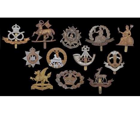 Group of badges to infantry regiments of the British army, Norfolk Regiment, Kings Shropshire Light Infantry, Devonshire Regi