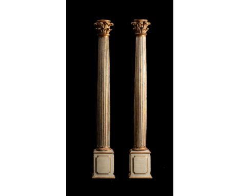 A PAIR OF PAINTED WOOD AND COLUMNS20TH CENTURYOf composite order, with acanthus capitals above fluted shafts and square secti