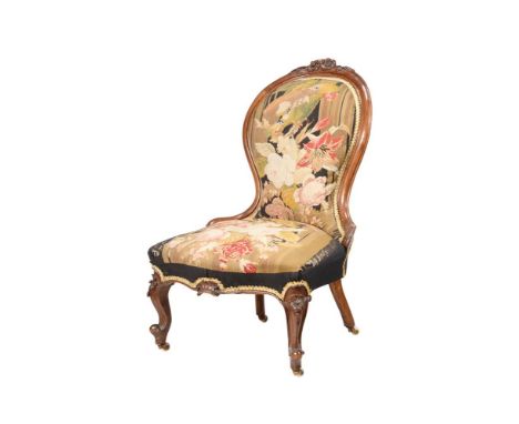A VICTORIAN WALNUT AND TAPESTRY UPHOLSTERED SIDE CHAIRCIRCA 1870The upholstery with parrot decoration94cm highTogether with a