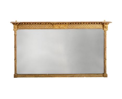 A GEORGE IV GILTWOOD OVERMANTEL WALL MIRROR CIRCA 1820With lattice frieze and cluster column supports81cm high, 141cm wide