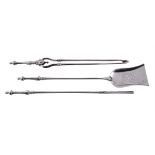 A SET OF THREE POLISHED STEEL FIRE TOOLS
