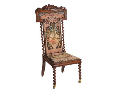 Y A VICTORIAN ROSEWOOD PRIE DIEUCIRCA 1860With tapestry to the high back and seat and with remains of a paper maker's label t