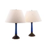 A PAIR OF BLUE GLASS AND PATINATED METAL COLUMNAR TABLE LAMPS