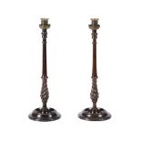 A PAIR OF MAHOGANY AND BRASS MOUNTED TABLE CANDLESTICKS IN SCOTTISH 18TH CENTURY TASTE