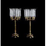 A PAIR OF FRENCH BRASS CANDELABRA IN EMPIRE TASTE