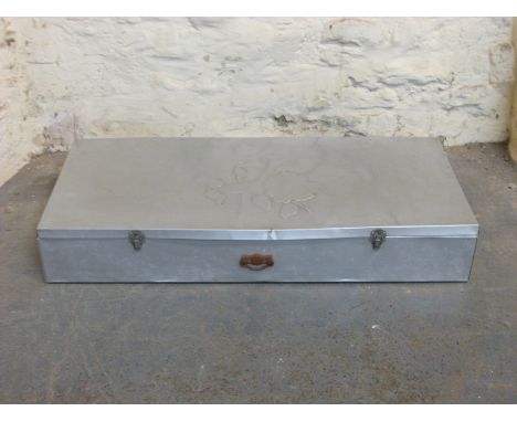 A large aluminium trunk or case with relief decoration of a rose