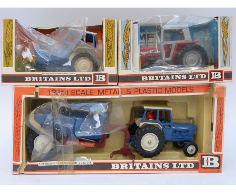 Three Britains model tractors Ford Tractor and Rear Dump 9630, Massey Ferguson 9522 and Ford 6600, all in original boxes. 