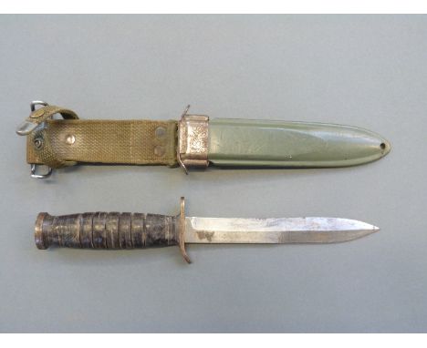 American WWII M3 US Marines fighting knife with 17cm blade, hilt marked US M-3 Utica, and original scabbard stamped US M8, ov