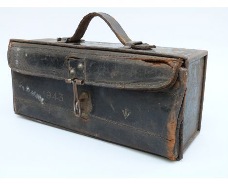 WWII military motorcycle tool box with embossed date 1943 and ministry arrow, 27 x 9 x 12cm
