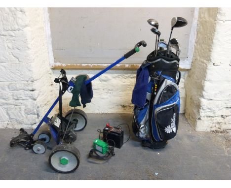 A set of golf clubs, bag, motorised trolley and a quantity of woodworking tools 